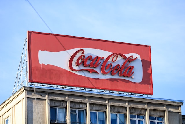 coca cola banner on top of building